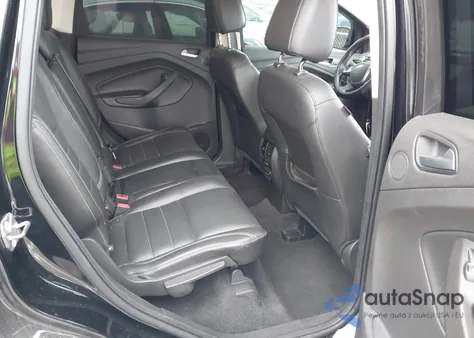 2016 Ford Escape Titanium z USA, uszkodzony, nr VIN 1FMCU0JX6GUB79270